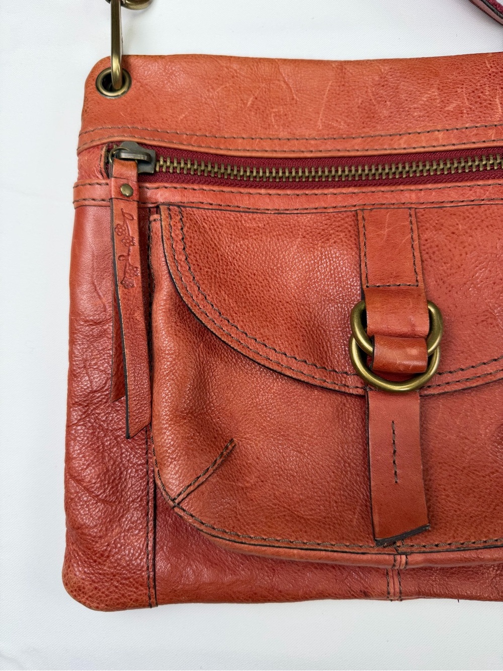 Gorgeously Distressed Fossil Orange/Red Leather Crossbody with Brass Ring Detail - Picture 3 of 16